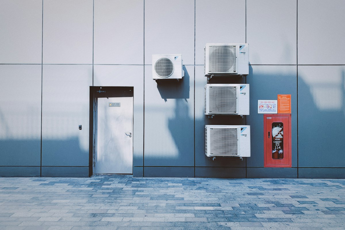 AC outdoor units on a wall